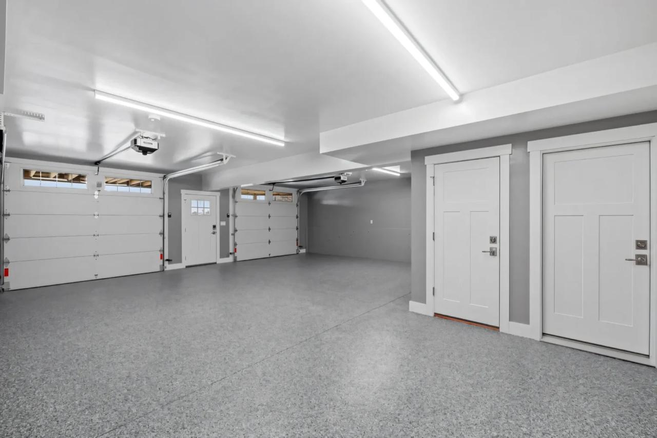 Beautiful residential garage with decorative epoxy flooring Beautiful residential garage with decorative epoxy flooring